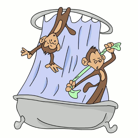 Two Cute Monkeys Swinging Off The Shower Curtain Rail.
